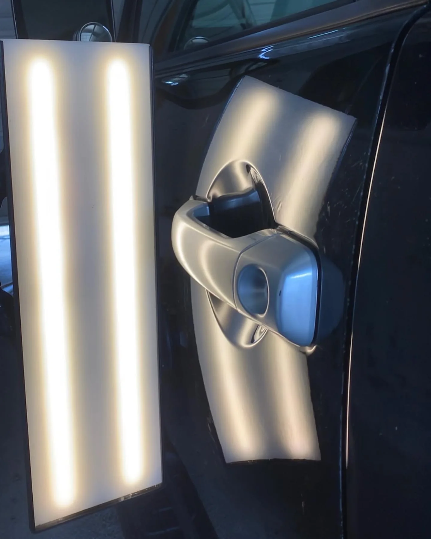 Door ding after paintless dent repair