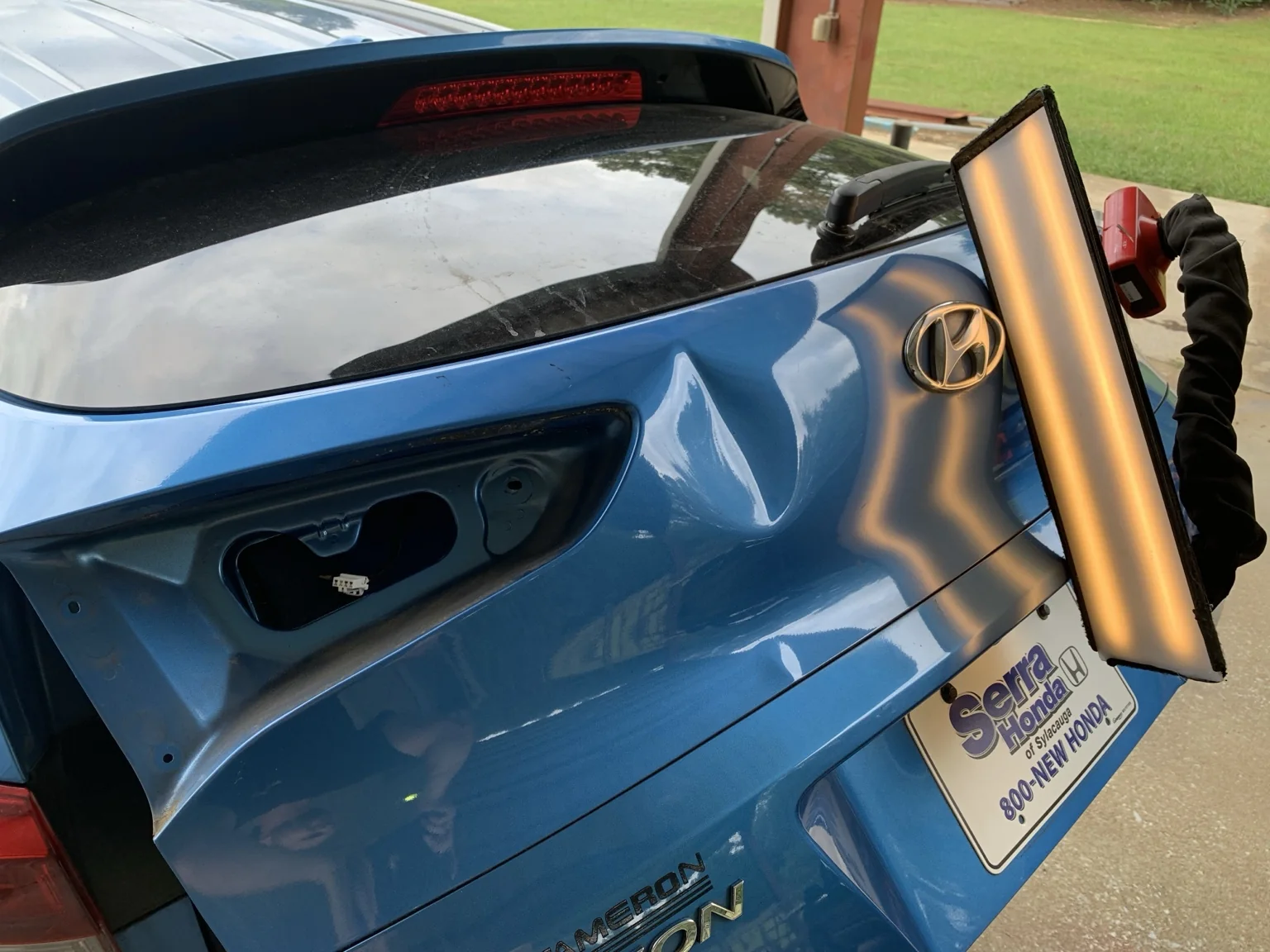 Hyundai liftgate damage before paintless dent repair