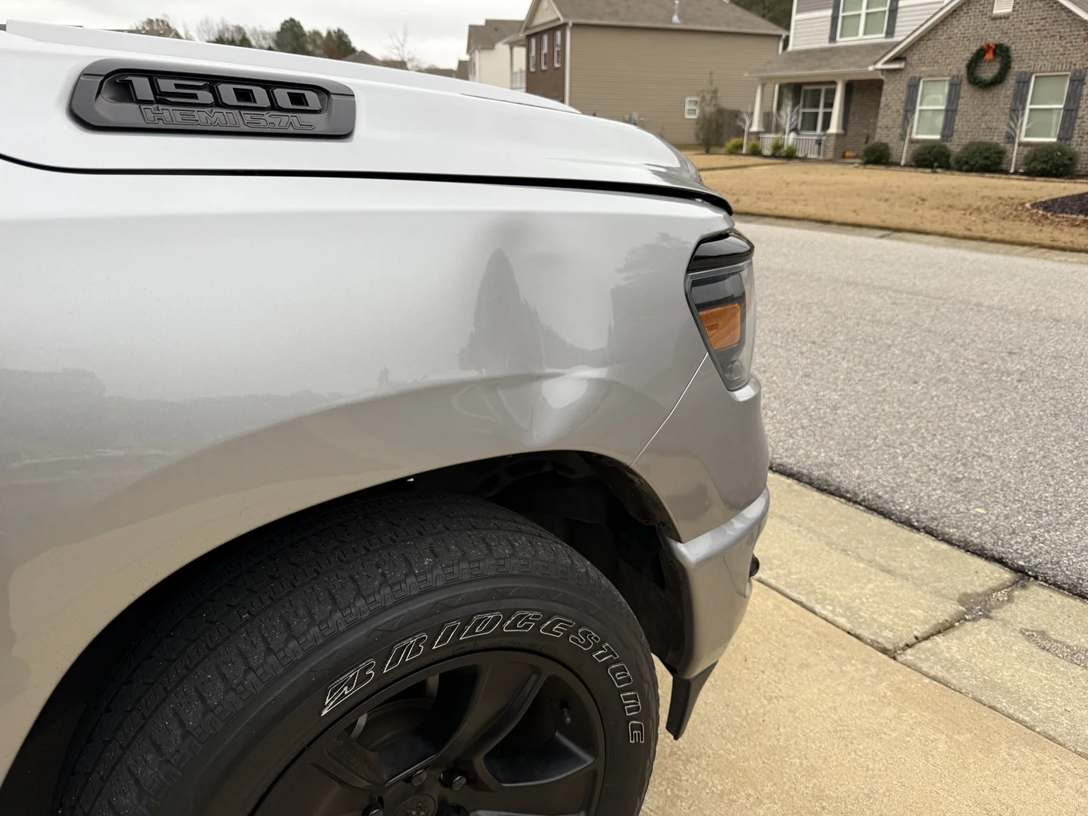 Ram 1500 fender dent before paintless dent repair